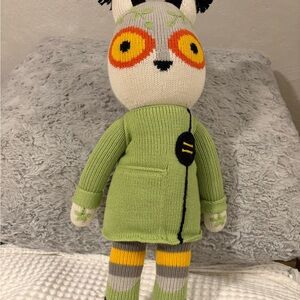 Whimsical Knit Plush Toy with Green and Yellow Outfit